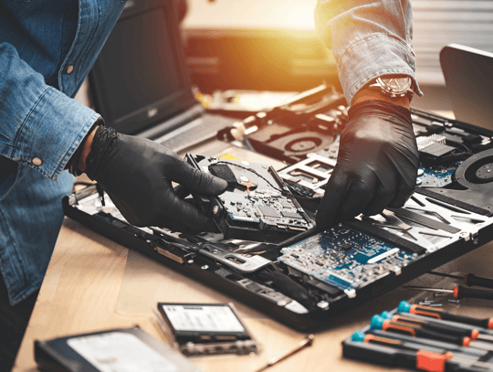 man-fixing-laptop