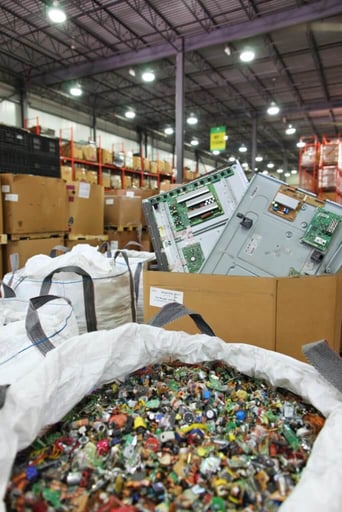 Shredded electronics in a bag